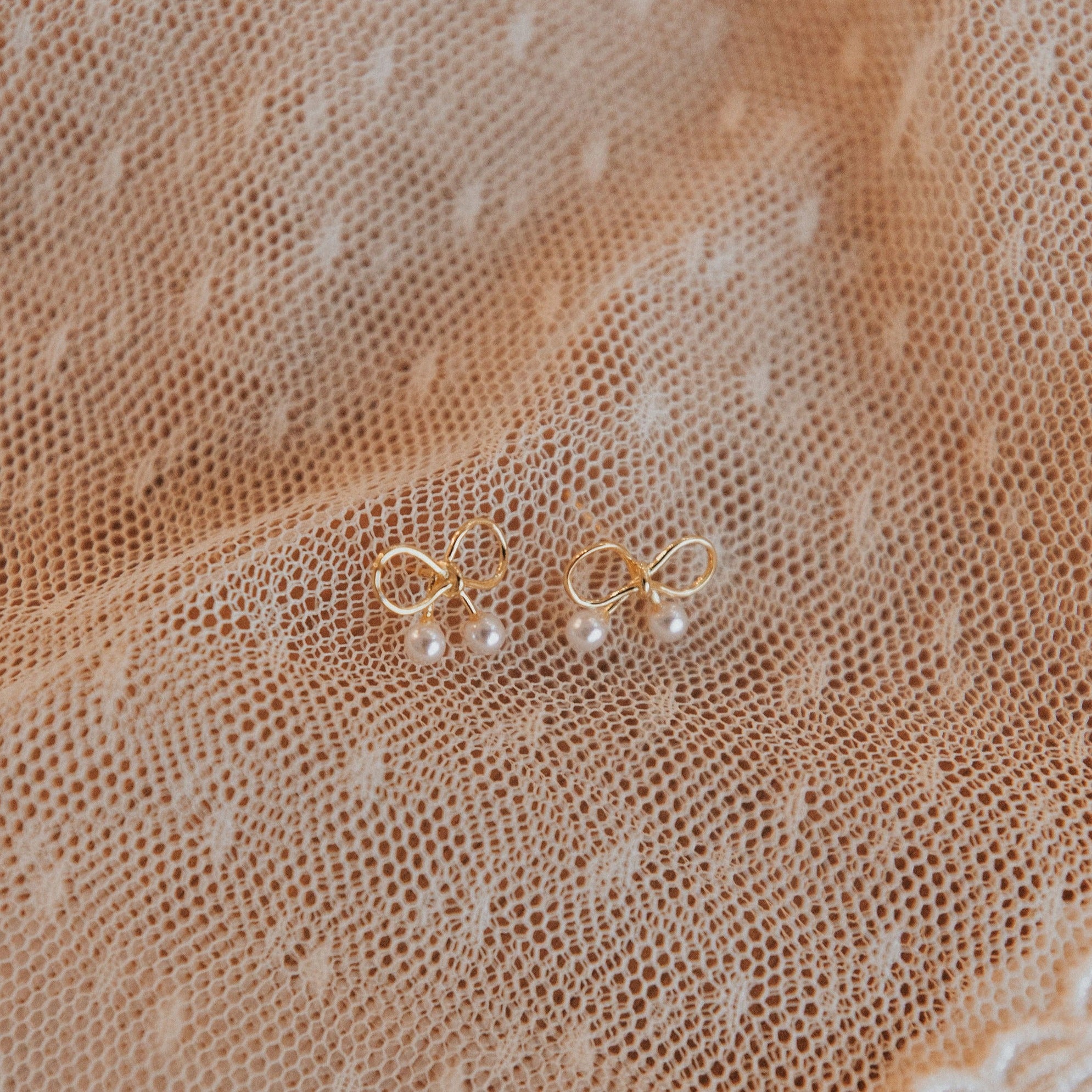Mila Pearl and Gold Bow Studs