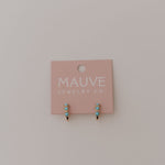 Load image into Gallery viewer, Pink jewelry card with turquoise and gold hoop earrings on a light gray background
