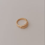 Load image into Gallery viewer, Gold ring on a light gray background

