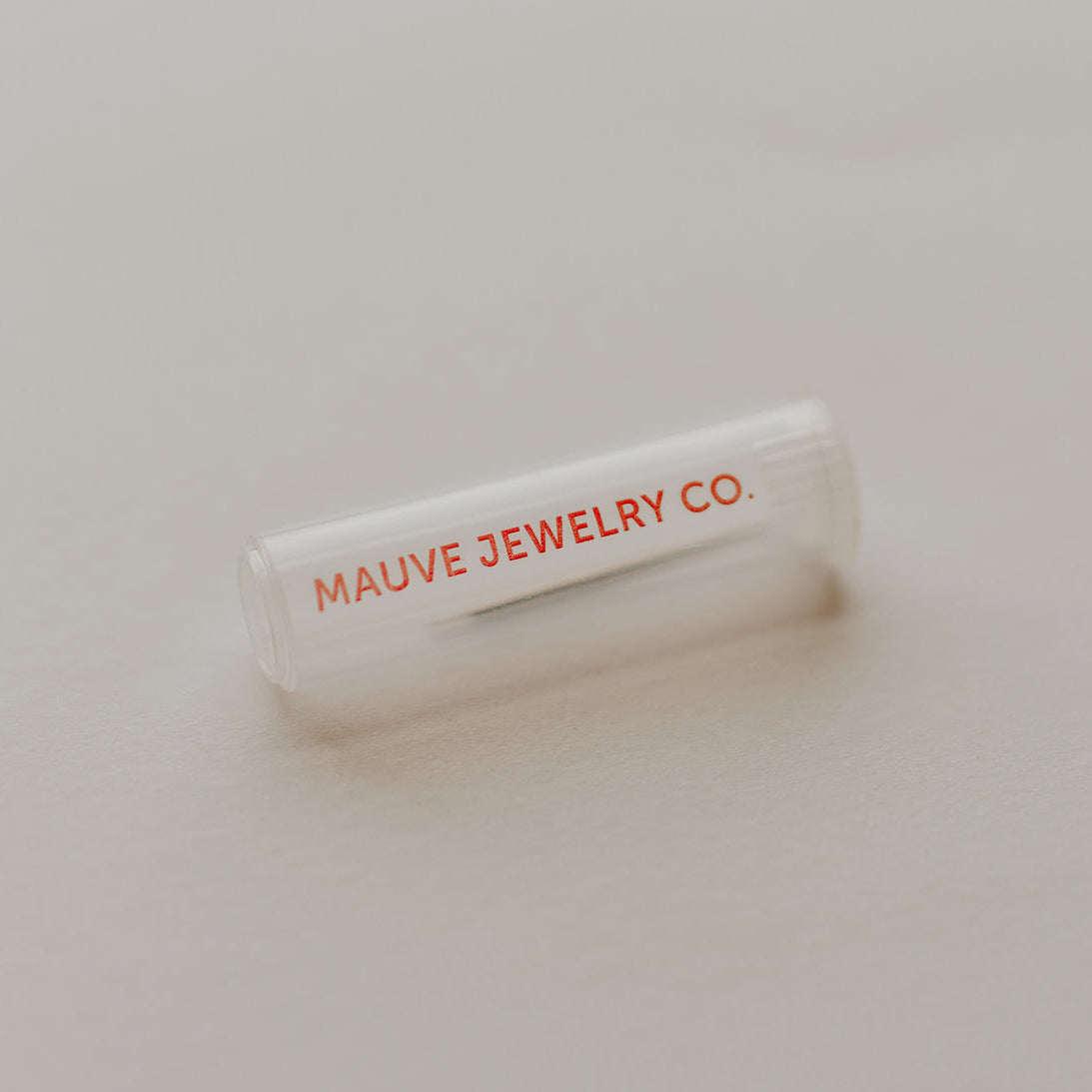 MAUVE JEWELRY CO. branded jewelry box on a neutral background